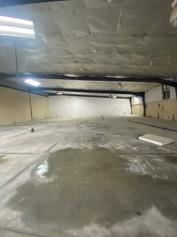 Warehouse under construction with reinforced framework and lighting in Costa del Este Panama