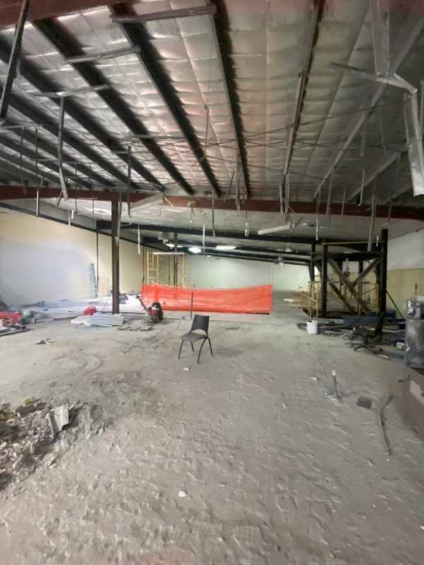 Unfinished spacious warehouse interior with metal beams and insulated ceiling Panama