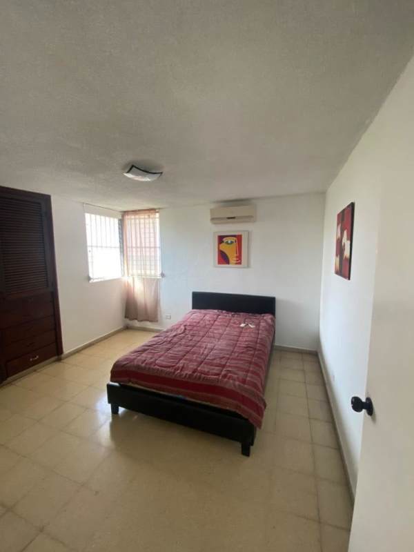 Bedroom with wardrobe split AC tiled floor Bella Vista Tower Panama