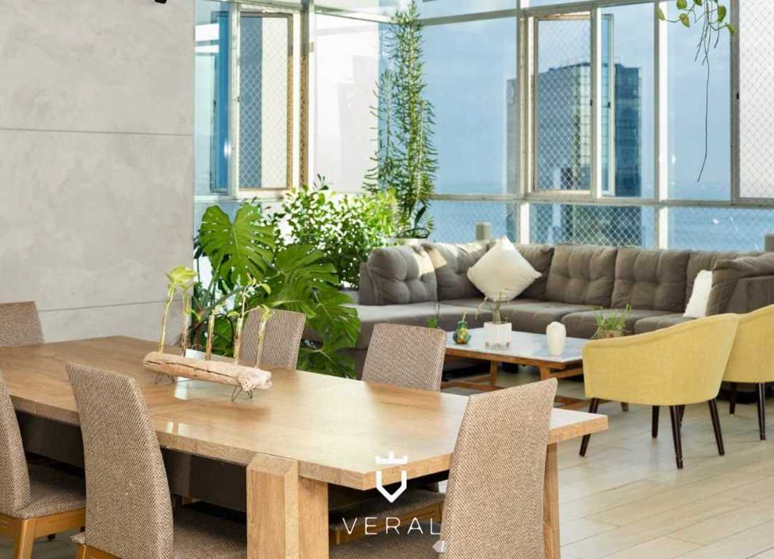 Open bright living and dining room with loft space and skyline views at PH Blue Park Panama