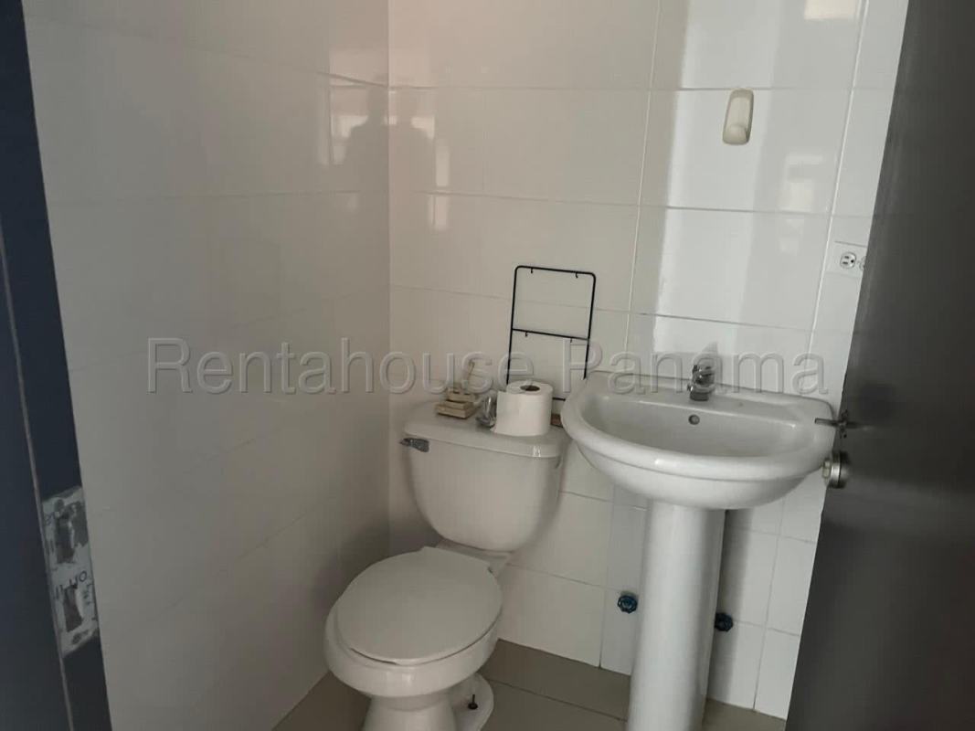 Swimming pool with lounge chairs and garden areas in PH Costa del Este Panama City