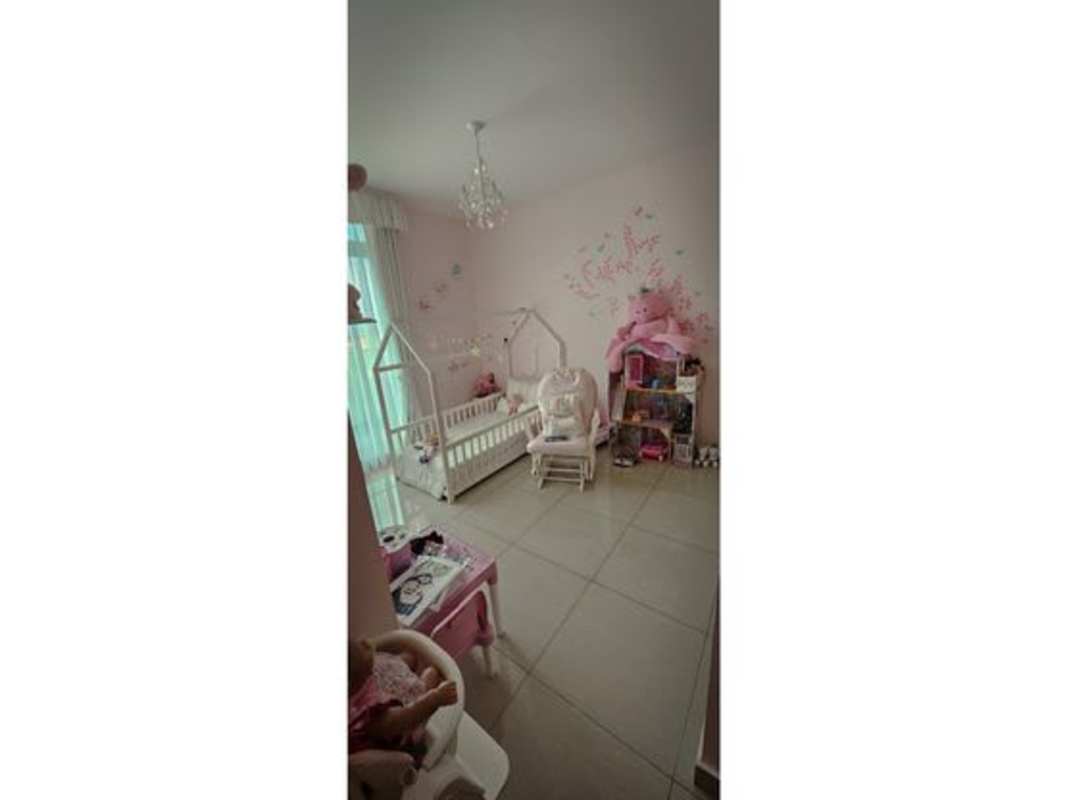 Modern living room with large windows overlooking ocean in PH South Coast Panama