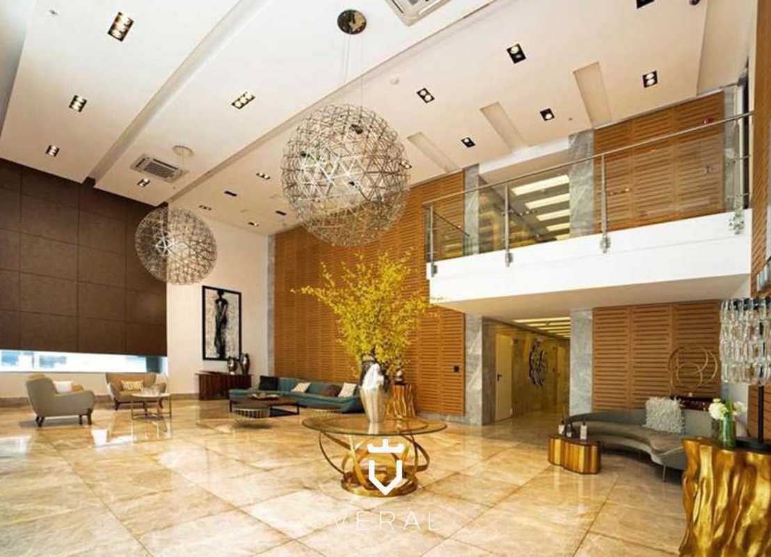 Modern semi-open kitchen with granite countertops, appliances, marble floor PH Luxor Tower 300