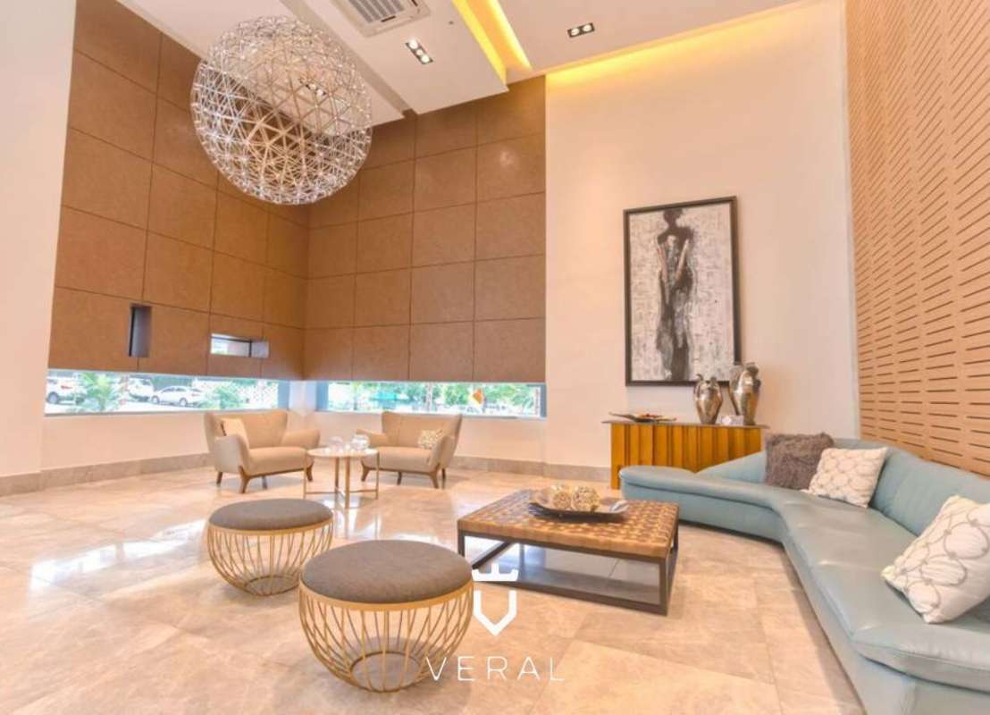 Open-plan dining and living area, marble floor, balcony with city view in PH Luxor Tower 300 El Cangrejo Panama City