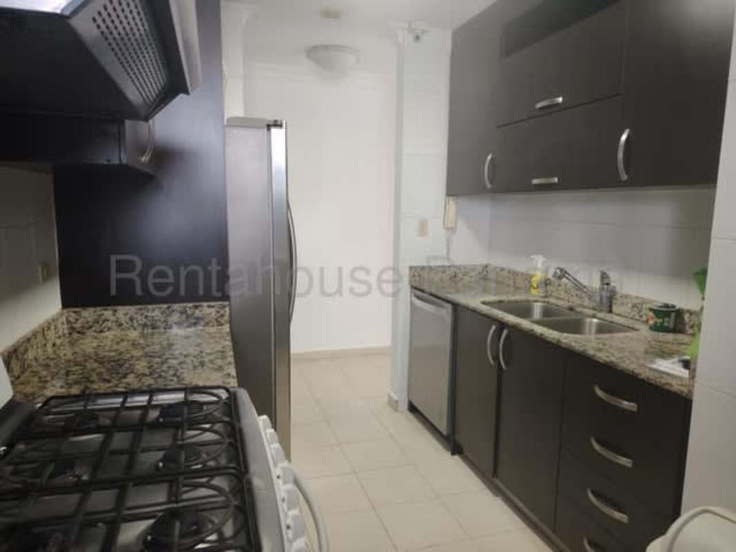 Modern bathroom with glass-enclosed shower, granite sink counter at PH Mandalay El Cangrejo Panama