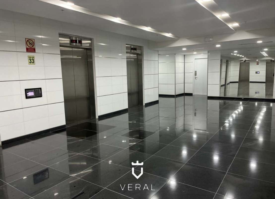 Commercial elevator bay with stainless steel doors and security in Ocean Business Plaza Panama Marbella