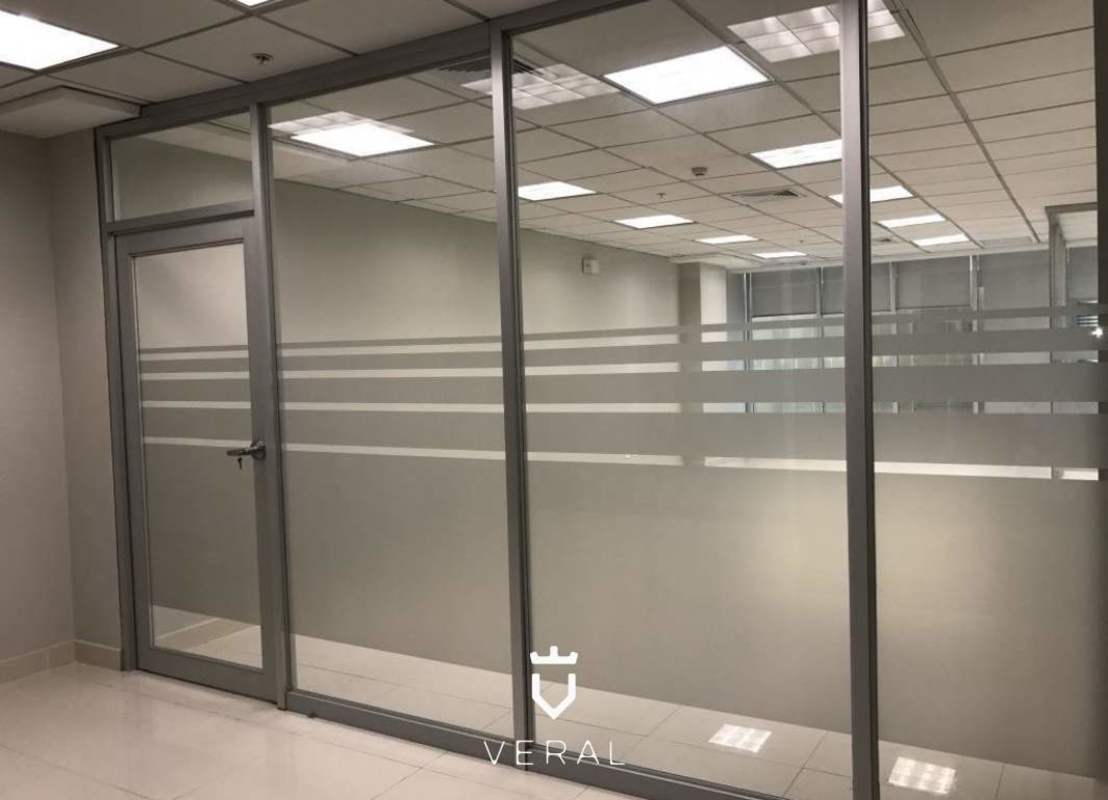 Modern corporate office with glass partitions and tiled floor for sale in Ocean Business Plaza Marbella Panama