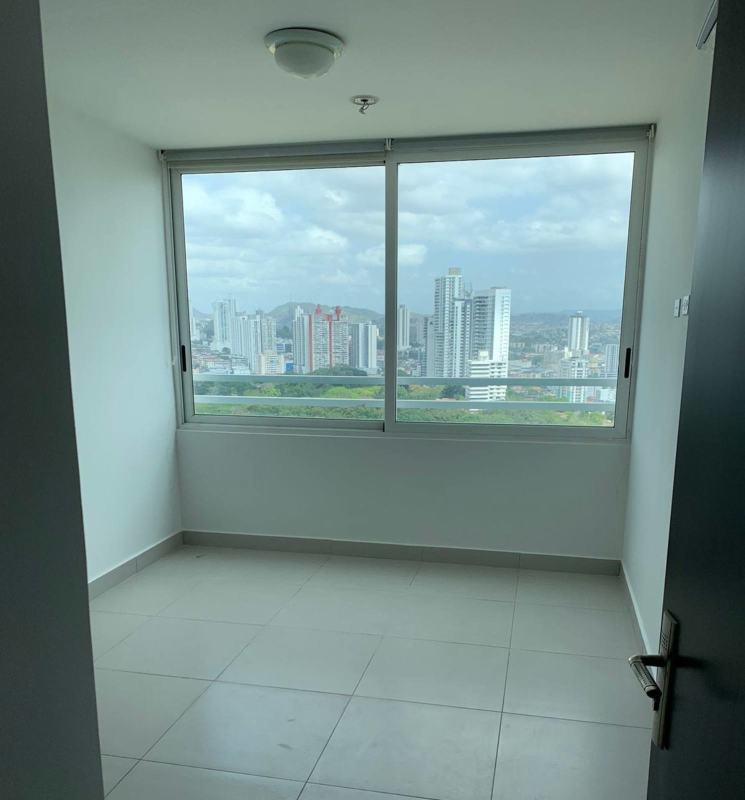 Bedroom with porcelain floor and park view window in PH Vista Tower San Francisco Panama City