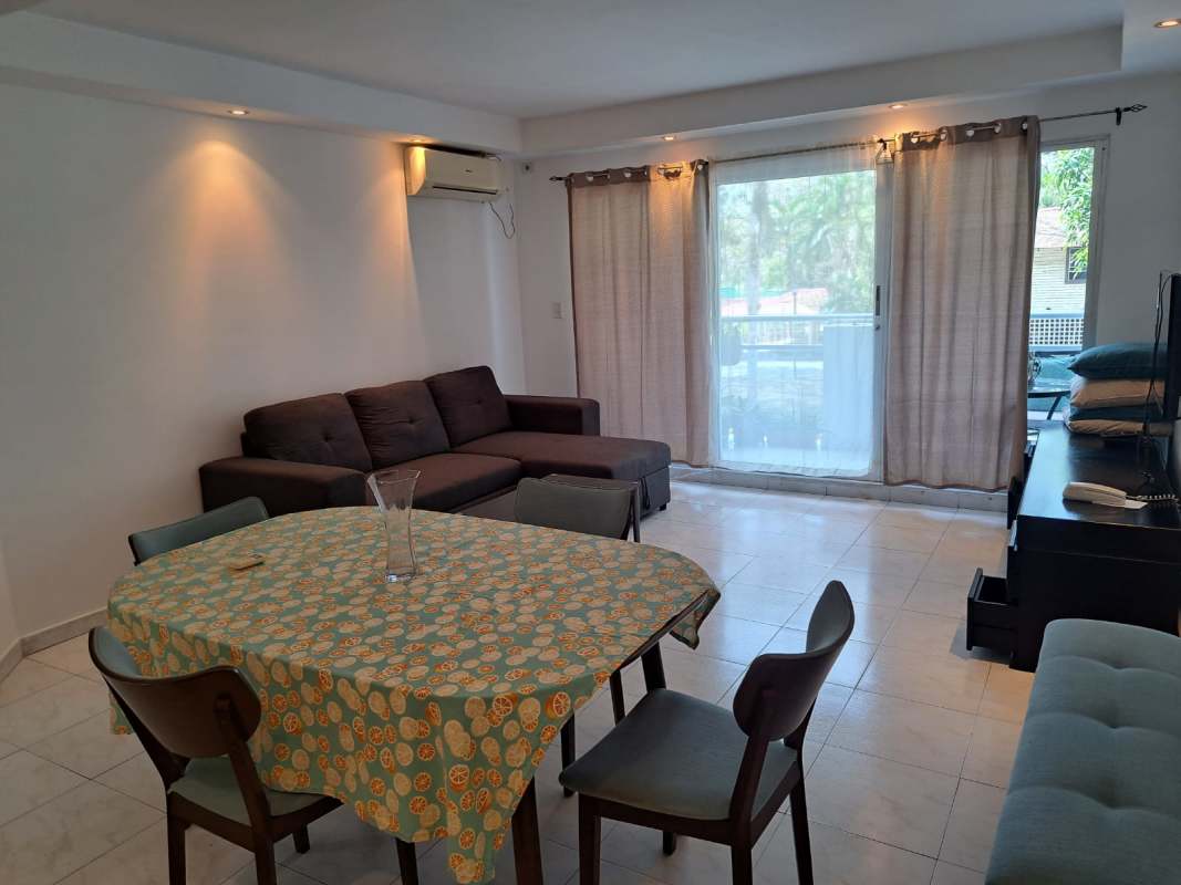Modern bathroom with granite countertop, large mirror, walk-in shower with frosted glass door, Clayton Panama
