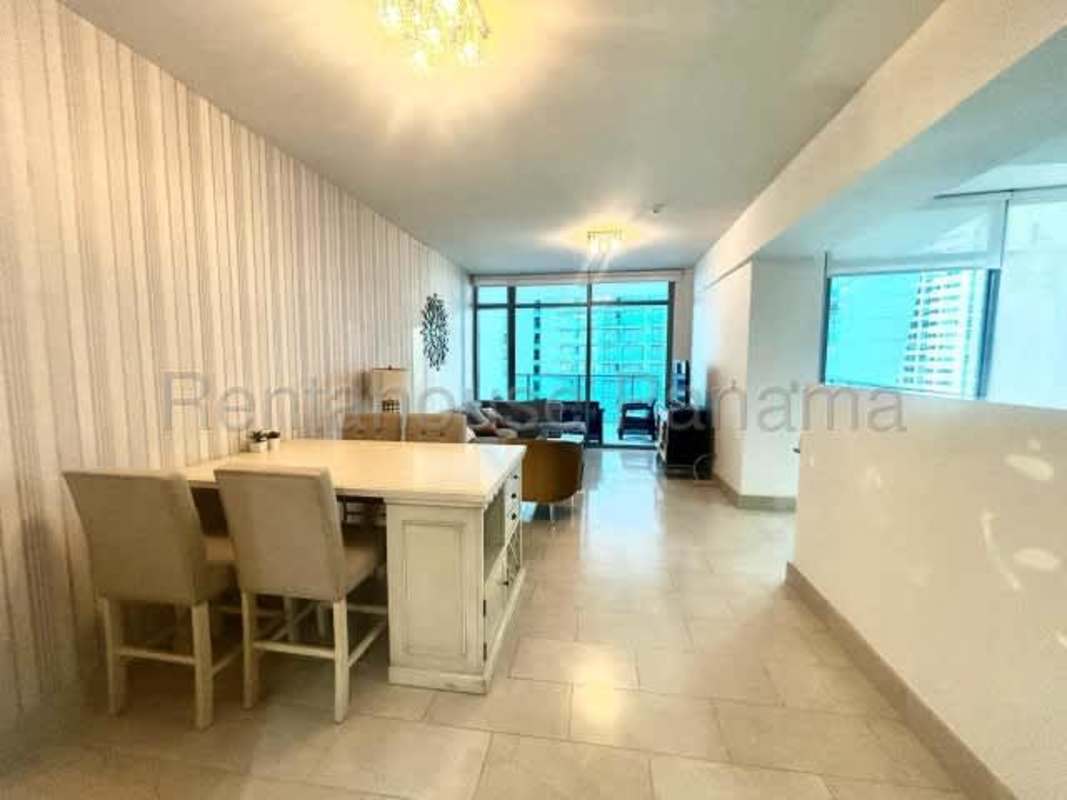 Bright living and dining room with city and ocean views in PH Grand Tower Punta Pacifica