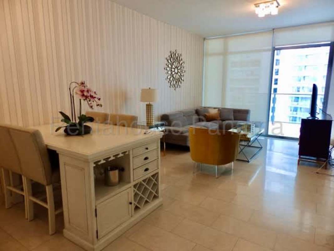 Modern kitchen with granite countertops and stainless appliances in PH Grand Tower Punta Pacifica Panama