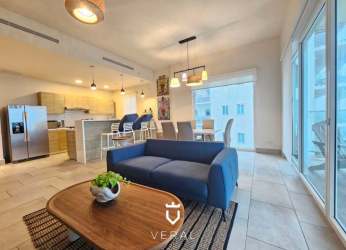 Bedroom with large window ocean view, queen bed, AC, closet in Playa Escondida condo Colon Panama