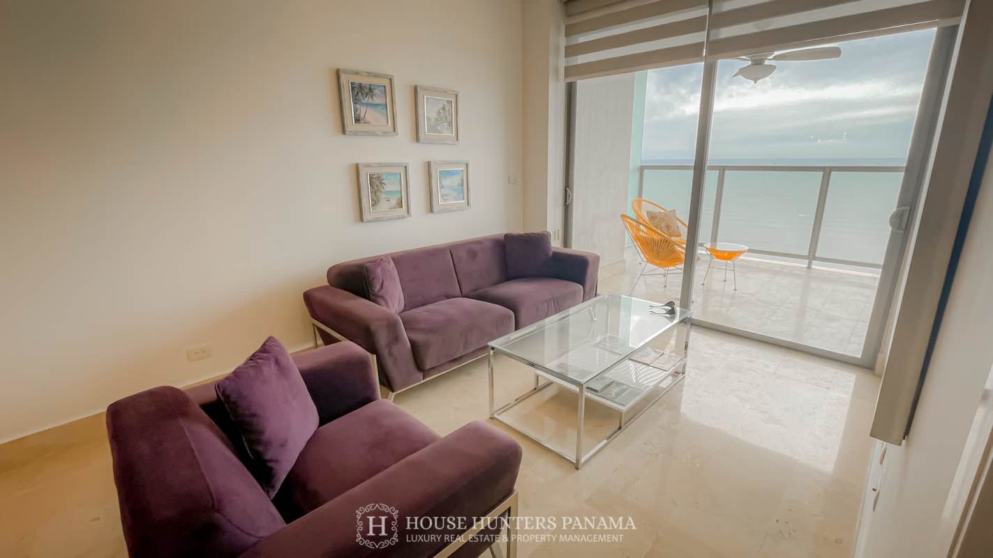 Private oceanfront balcony with lounge chairs and spectacular bay views at Yoo Panama