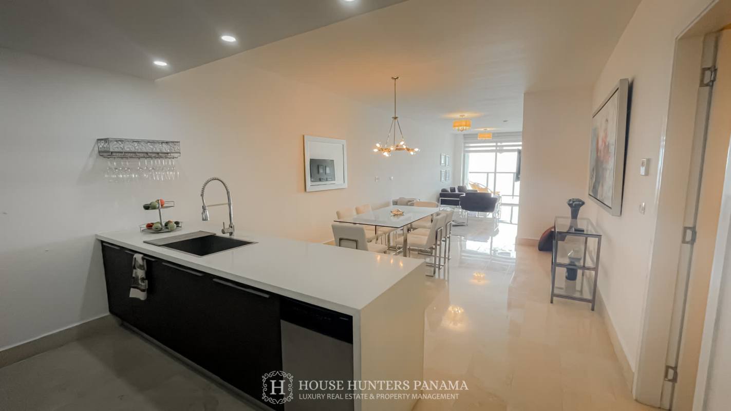 Open layout living dining with floor to ceiling windows, oceanview in Yoo Panama
