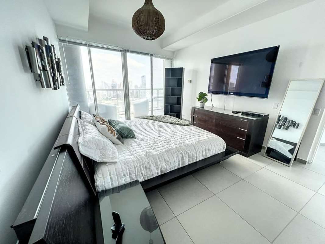 Modern open plan living area with large windows and panoramic oceanfront vistas PH BICSA Tower Panama
