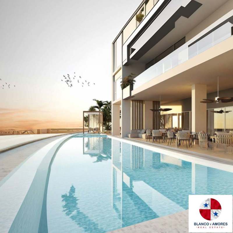 Stylish apartment building façade with balconies and lush landscaping Ocean Reef Panama