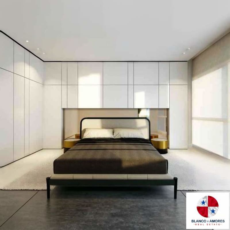 Minimalist luxury bedroom with city views built-in cabinetry floor-to-ceiling windows Ocean Reef Panama