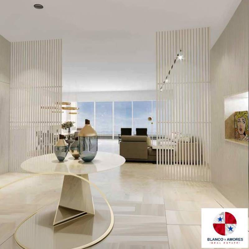 Open concept living room with ocean views, partition slats, marble floors in Ocean Reef Islands Panama