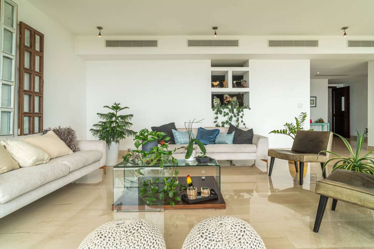 Modern spacious living and dining room with marble floors large glass windows PH Zeus Costa del Este Panama