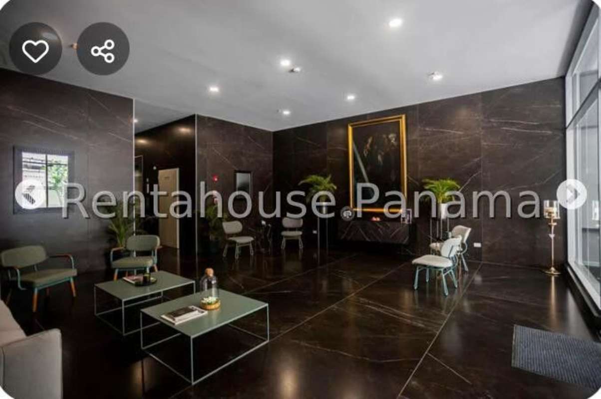 Elegant marble lobby with concierge and seating PH Quartier Marbella luxury tower in Panama City