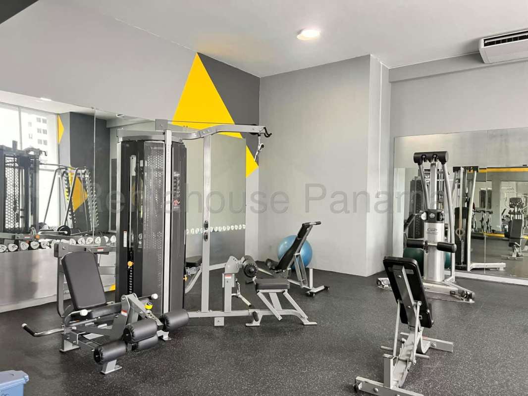 Indoor gym with equipment, mirrored walls, geometric design PH Cangrejo Loft