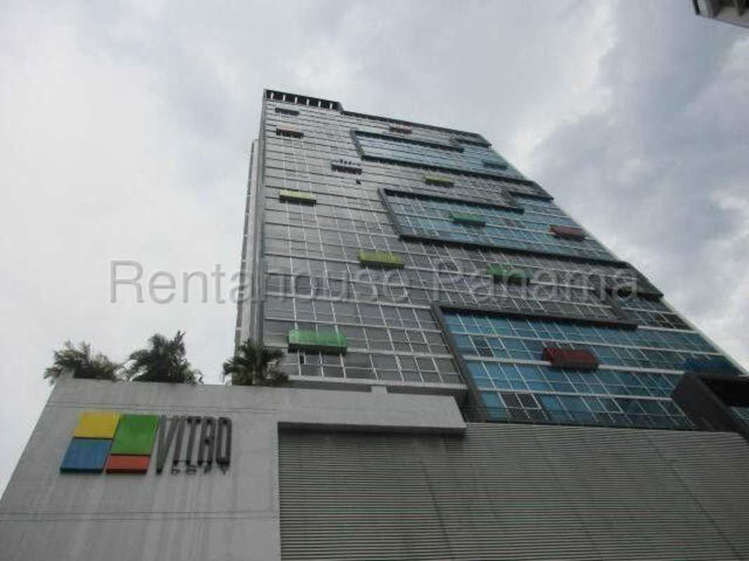 Tall modern high-rise building with glass and color panels PH Cangrejo Loft in El Cangrejo Panama City