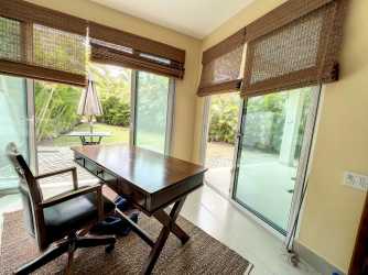 Resort-style oceanfront infinity pool surrounded by palm trees PH Casamar San Carlos Panama