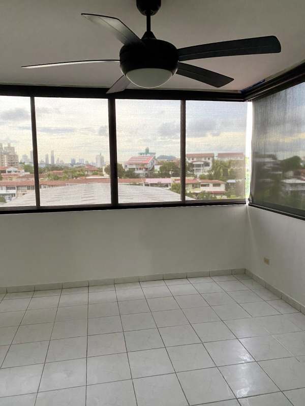Panoramic window enclosed balcony space overlooking Betania Panama City