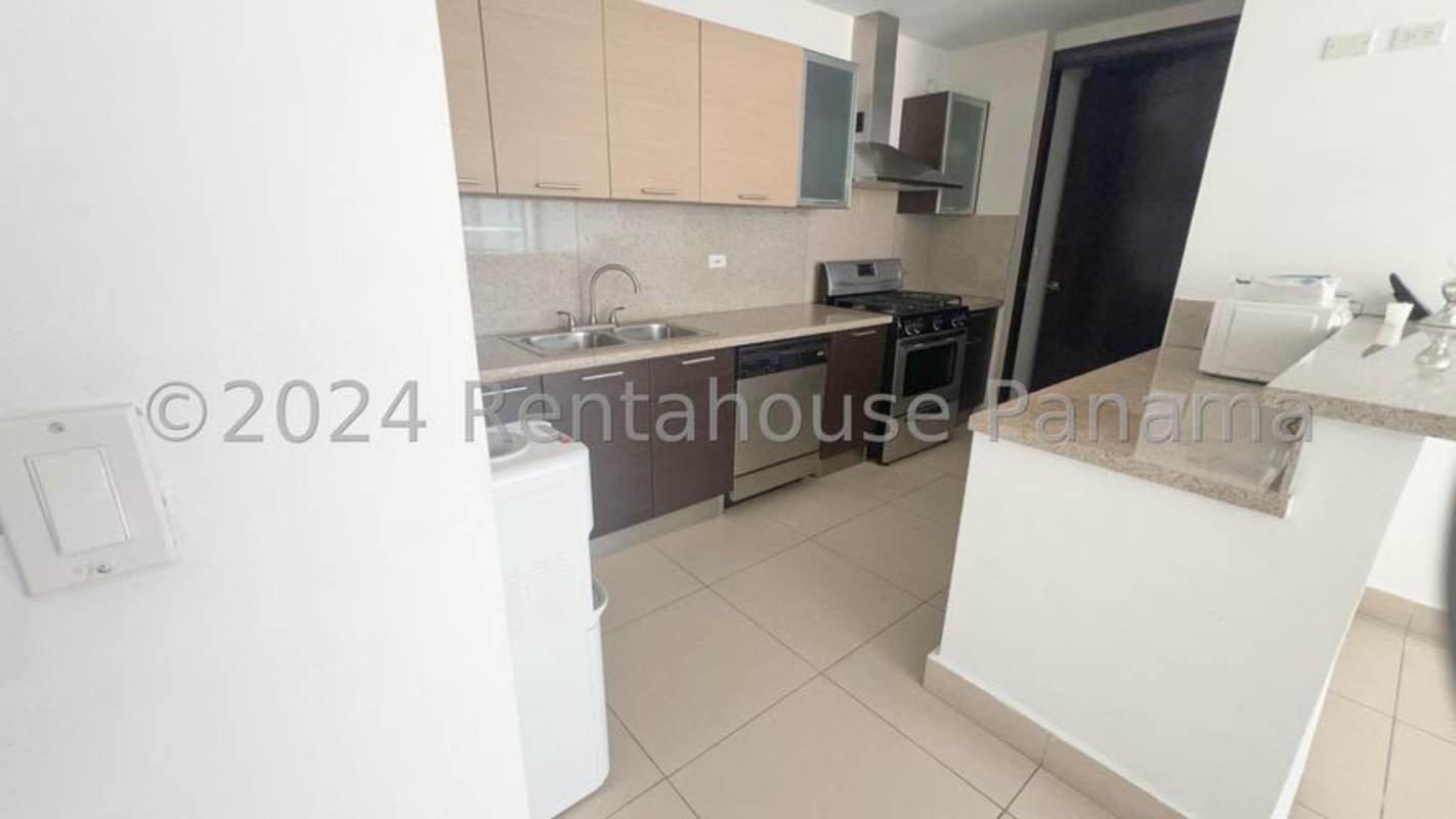 Balcony with glass railing offering panoramic ocean and skyline views from PH Dupont Tower Panama City