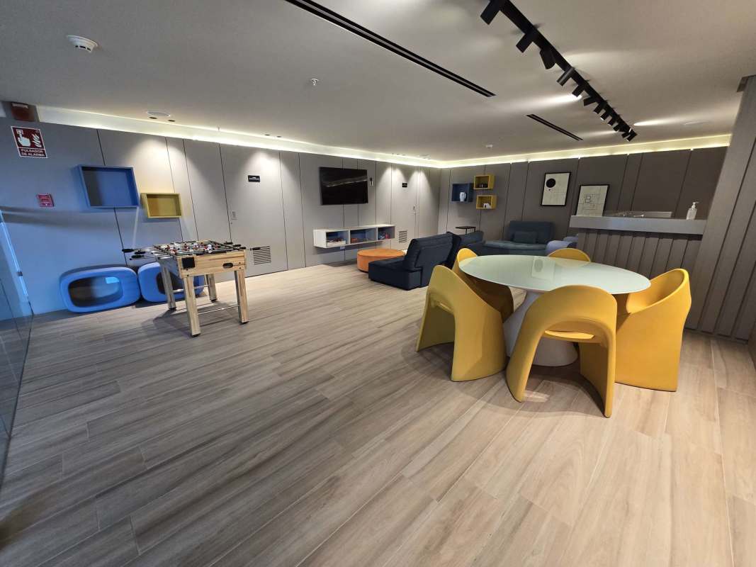 Large balcony terrace with ocean and city skyline view at PH Costanera Panama