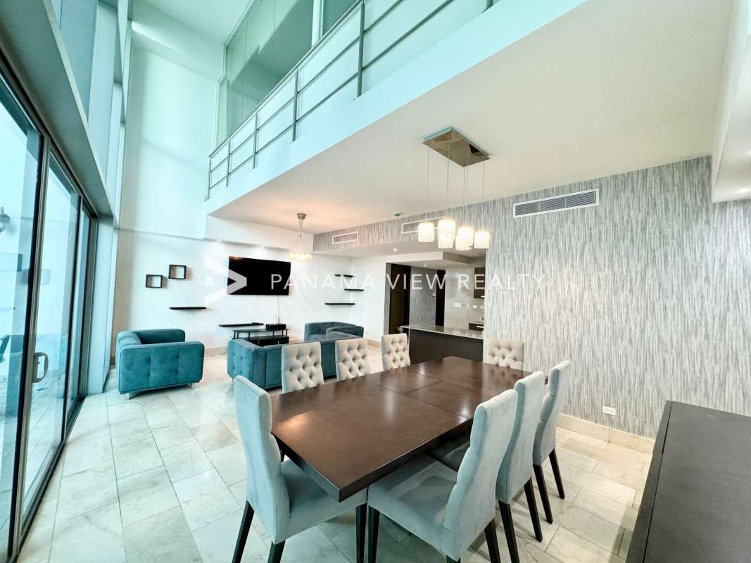 Spacious two-level apartment with double-height ceiling, marble floors and ocean view in PH Grand Tower Punta Pacifica Panama