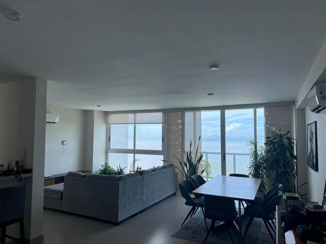 Bedroom with large balcony access and ocean view at PH Costa del Mar Costa del Este Panama