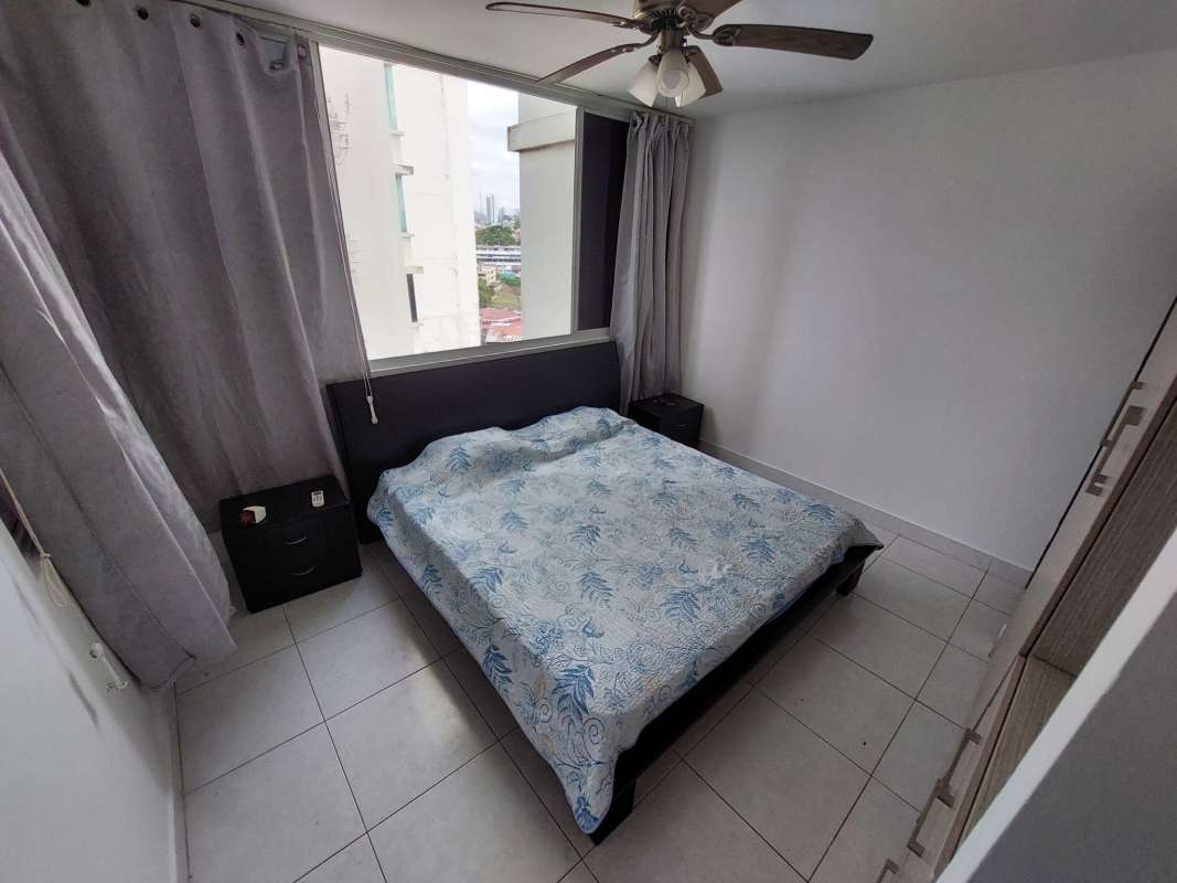 Bedroom with window, curtains and ceiling fan in PH Edison Park Panama