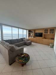 Bright kitchen with granite counters and white cabinets ocean view Coronado Panama