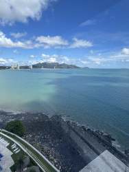 Balcony with striped hammock overlooking Pacific Ocean in Playa Serena Coronado Panama