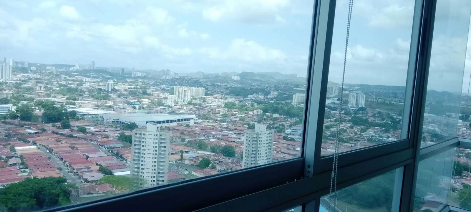 City skyline and ocean view from balcony of PH Riverside Costa del Este Panama City