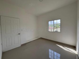 Bright bedroom with ceramic floors window built-in closet in new home Barrio Fino Colon