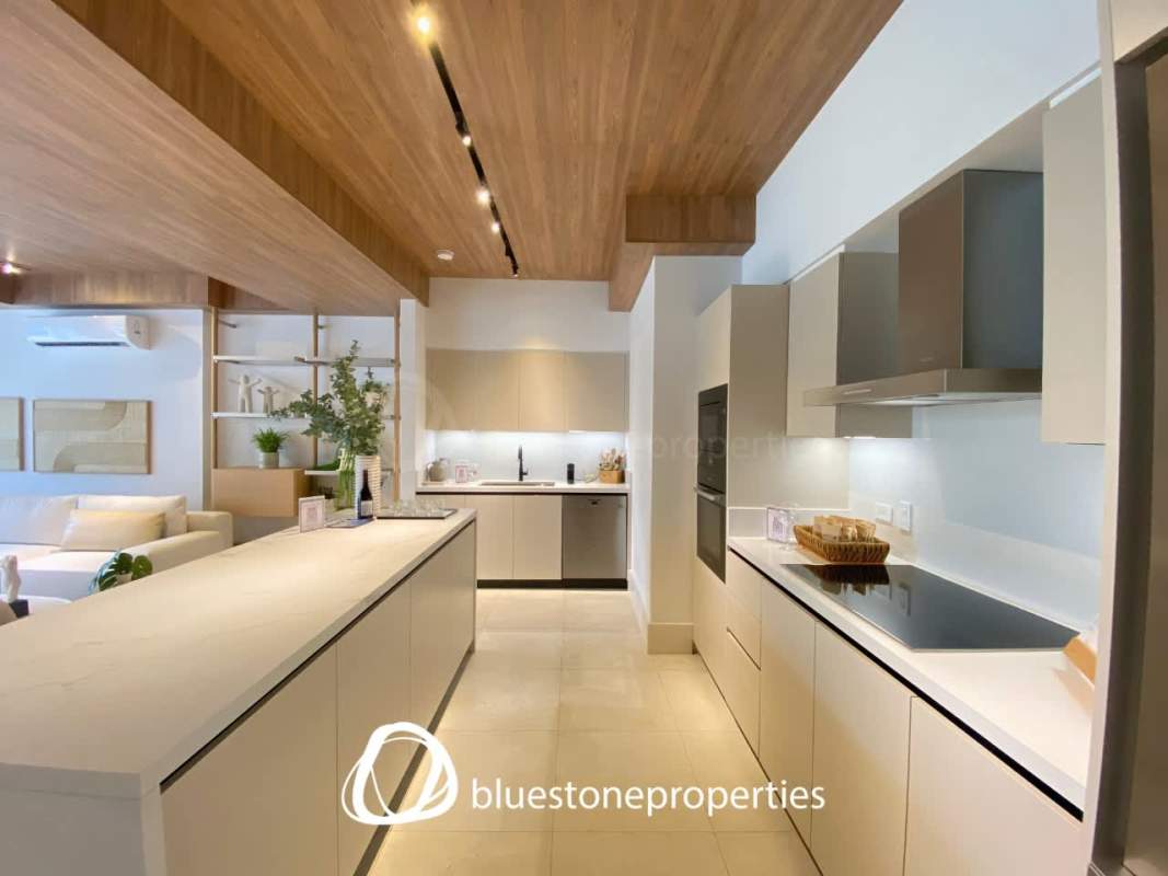 Open-concept living room with panoramic windows and ocean views at PH Oceana Santa María