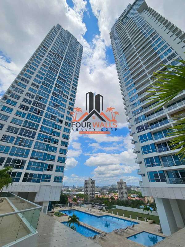 Exterior view twin high-rise towers with outdoor pool Costa del Este Panama City