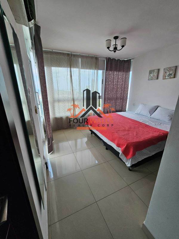 Spacious lobby at PH Top Towers Costa del Este with marble floors modern design