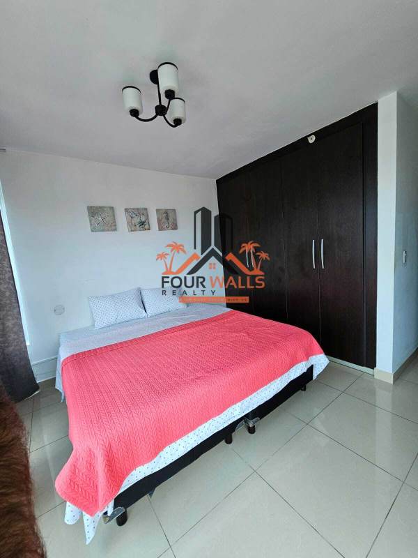 Bedroom with built-in wardrobe split AC window Costa del Este Panama