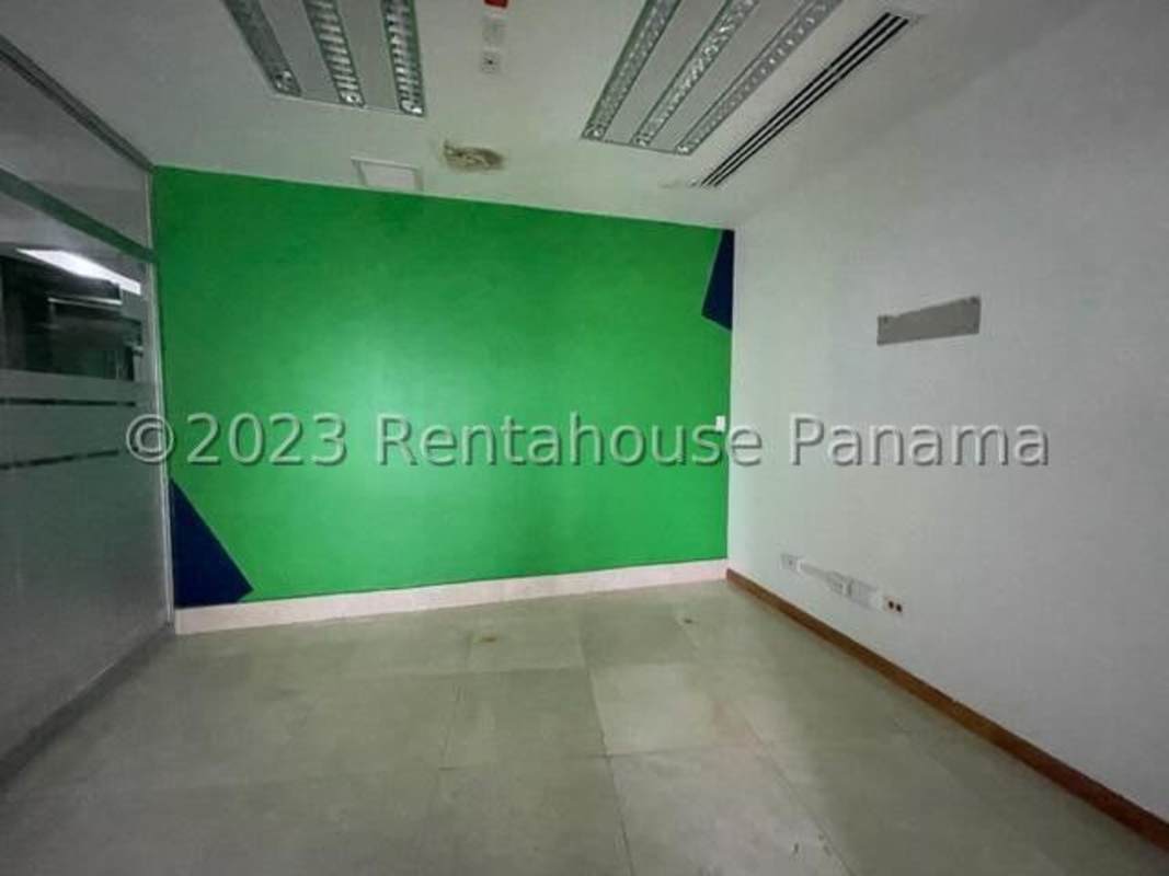 Modern office with glass meeting rooms inside F&F Tower in financial district Panama