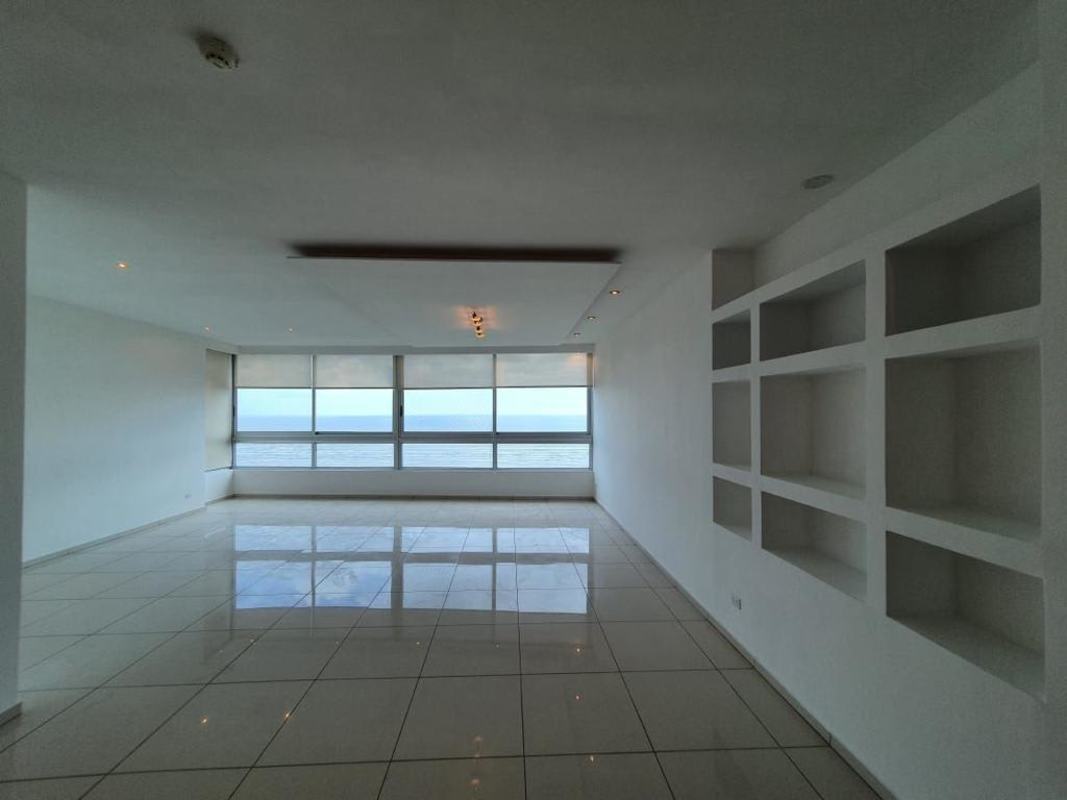 Modern living room with large panoramic window and ocean view in PH Altamar del Este Costa del Este Panama