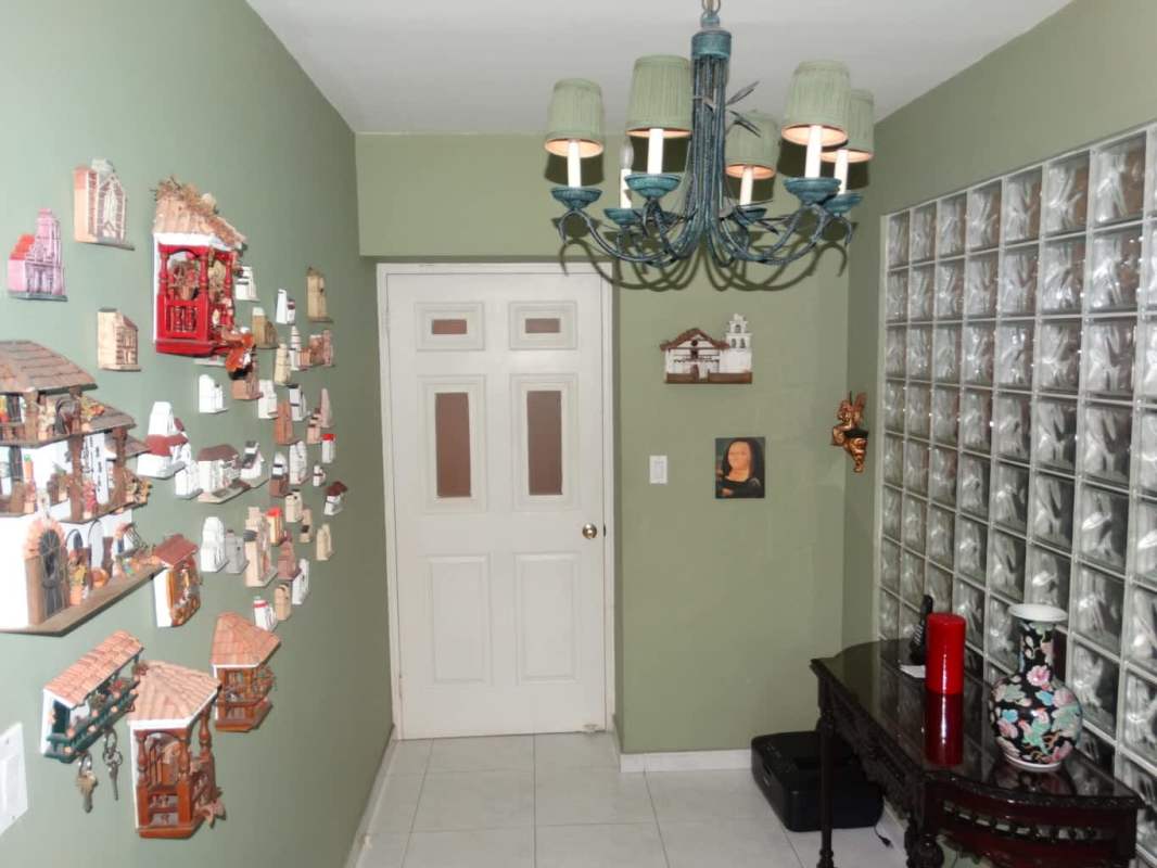 Master bedroom featuring oceanview windows, large closet, and luxury bath in Avenida Balboa Panama