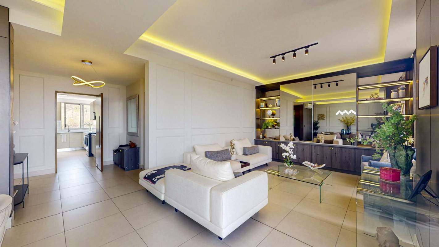 Stylish living room with recessed lighting and mirrored wall in PH 4 Horizontes Altos de Panama