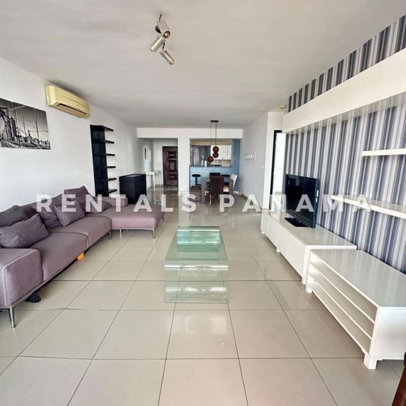 Modern kitchen with granite countertops, appliances, and window view at PH The Regent Panama City