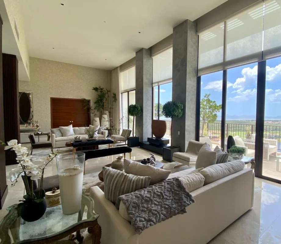 Spacious luxury living room with panoramic windows marble floors and skyline views PH Santa Maria Panama