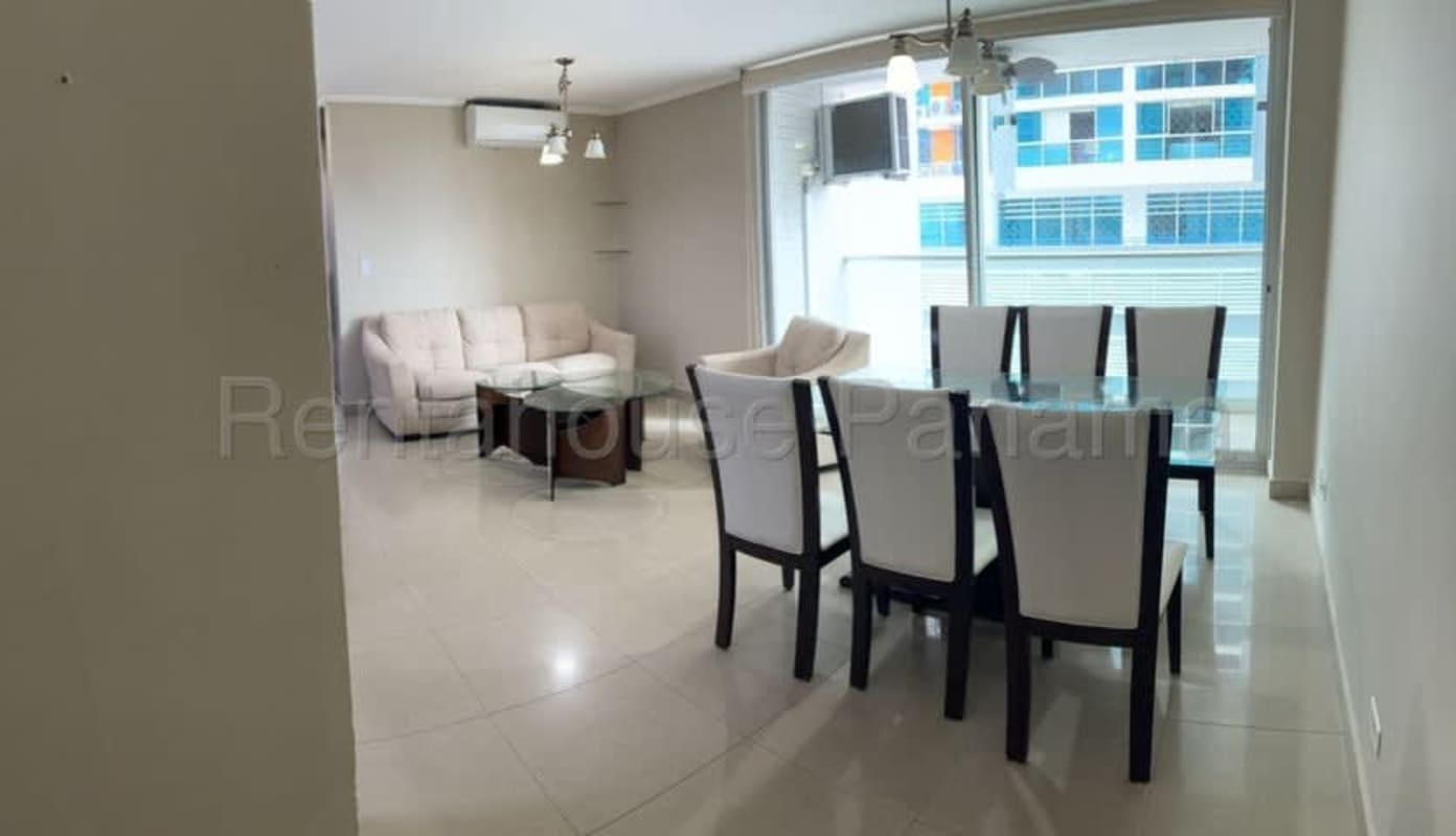 Large living dining room with windows and balcony access PH Costa del Este Panama City