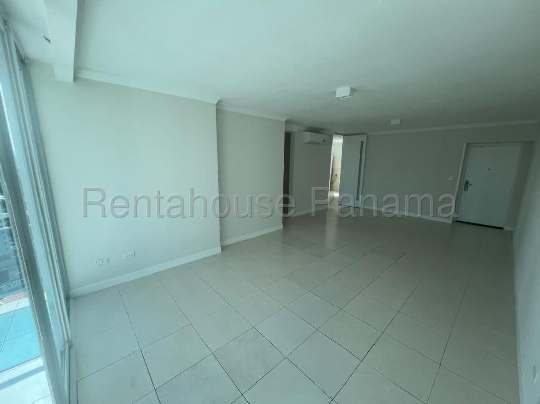 Large balcony with glass railing overlooking Panama City in PH Mont Royale