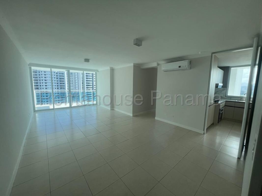 Bright living-dining room with tile floors and balcony access in PH Mont Royale El Cangrejo Panama